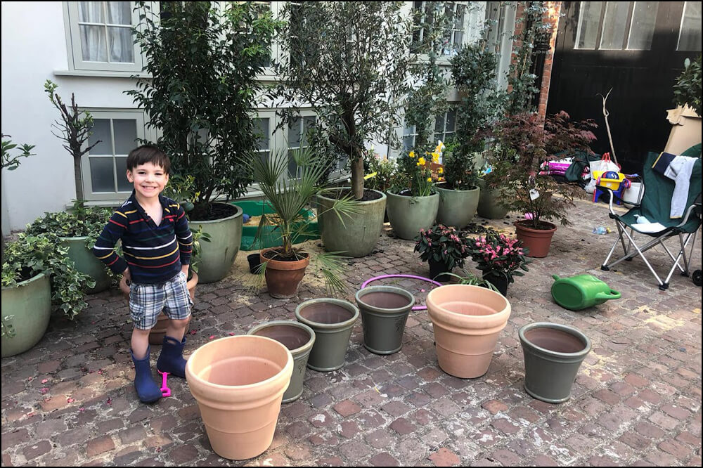 Young Lockdown Gardener with Glazed Terracotta Pots by Riverhill Garden Supplies
